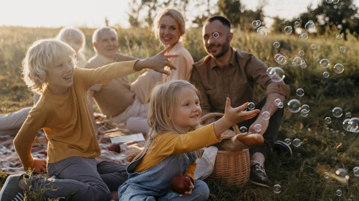 full-shot-happy-family-outdoors